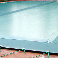 Copertura invernale con fascia filtrante centrale con occhielli e cavo elastico per piscina rettangolare - 210 g/mq